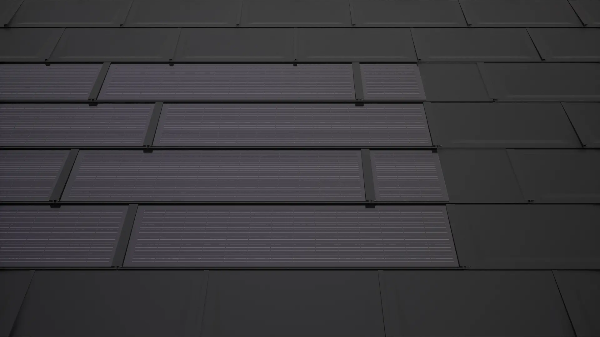 PREFA Solardachplatten in Schwarz mit Ergänzungsplatten. Diese sorgen für eine rechteckige Modulfläche und tragen zu einem harmonischen Gesamtbild auf dem Solardach bei.